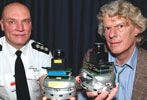 Dr Jacques Penders (right) and South Yorkshire Fire & Rescue’s Neil Baugh with a pair of Guardian robots